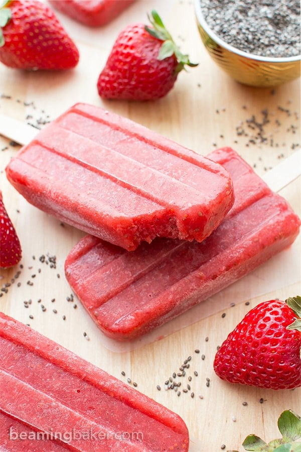 Vegan Strawberry Chia Seed Popsicles (V+GF): a 3 ingredient recipe for delicious, refreshing strawberry popsicles bursting with chia seeds. #Vegan #DairyFree #GlutenFree | BeamingBaker.com