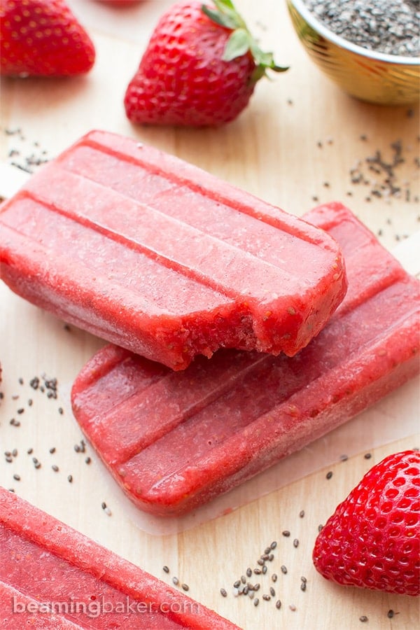 Vegan Strawberry Chia Seed Popsicles (V+GF): a 3 ingredient recipe for delicious, refreshing strawberry popsicles bursting with chia seeds. #Vegan #DairyFree #GlutenFree | BeamingBaker.com