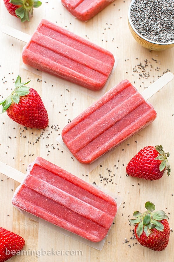 Vegan Strawberry Chia Seed Popsicles (V+GF): a 3 ingredient recipe for delicious, refreshing strawberry popsicles bursting with chia seeds. #Vegan #DairyFree #GlutenFree | BeamingBaker.com