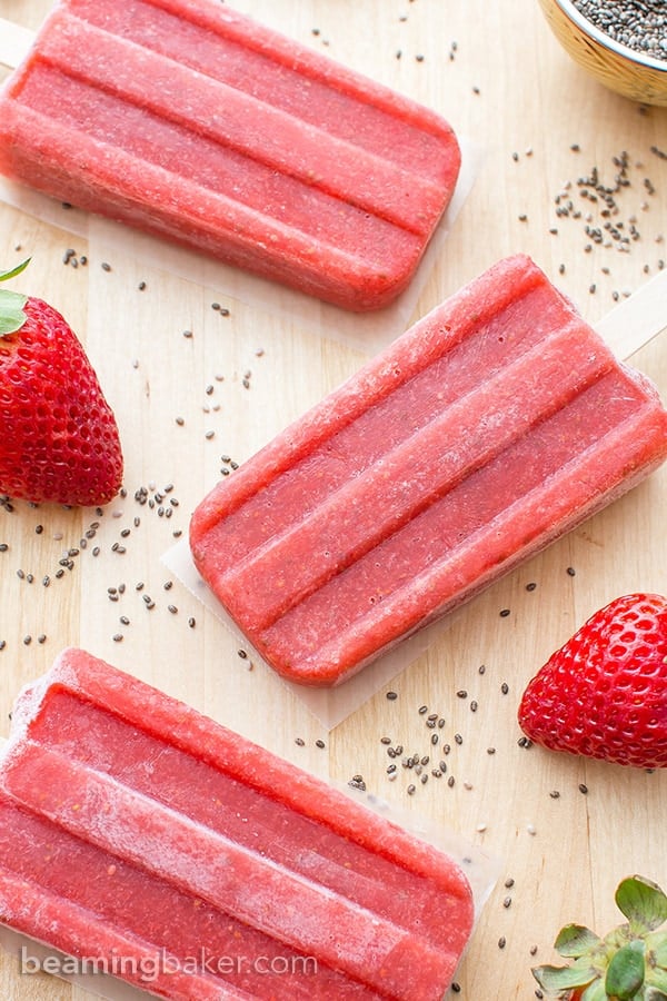 Vegan Strawberry Chia Seed Popsicles (V+GF): a 3 ingredient recipe for delicious, refreshing strawberry popsicles bursting with chia seeds. #Vegan #DairyFree #GlutenFree | BeamingBaker.com