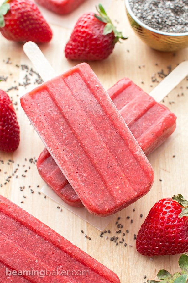 Vegan Strawberry Chia Seed Popsicles (V+GF): a 3 ingredient recipe for delicious, refreshing strawberry popsicles bursting with chia seeds. #Vegan #DairyFree #GlutenFree | BeamingBaker.com