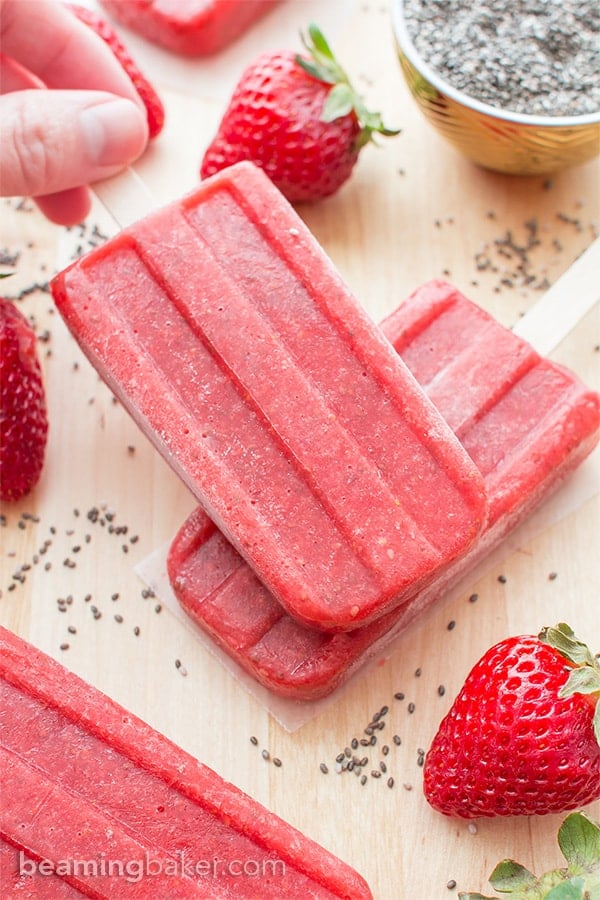 Vegan Strawberry Chia Seed Popsicles (V+GF): a 3 ingredient recipe for delicious, refreshing strawberry popsicles bursting with chia seeds. #Vegan #DairyFree #GlutenFree | BeamingBaker.com