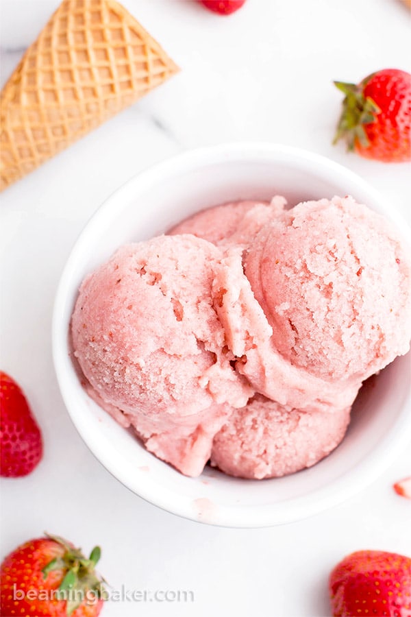 4 Ingredient Homemade Strawberry Sorbet (V+GF): an easy recipe for deliciously creamy and refreshing strawberry sorbet. #Vegan #DairyFree #Paleo #GlutenFree | BeamingBaker.com