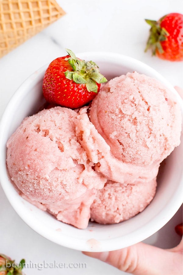 4 Ingredient Homemade Strawberry Sorbet (V+GF): an easy recipe for deliciously creamy and refreshing strawberry sorbet. #Vegan #DairyFree #Paleo #GlutenFree | BeamingBaker.com