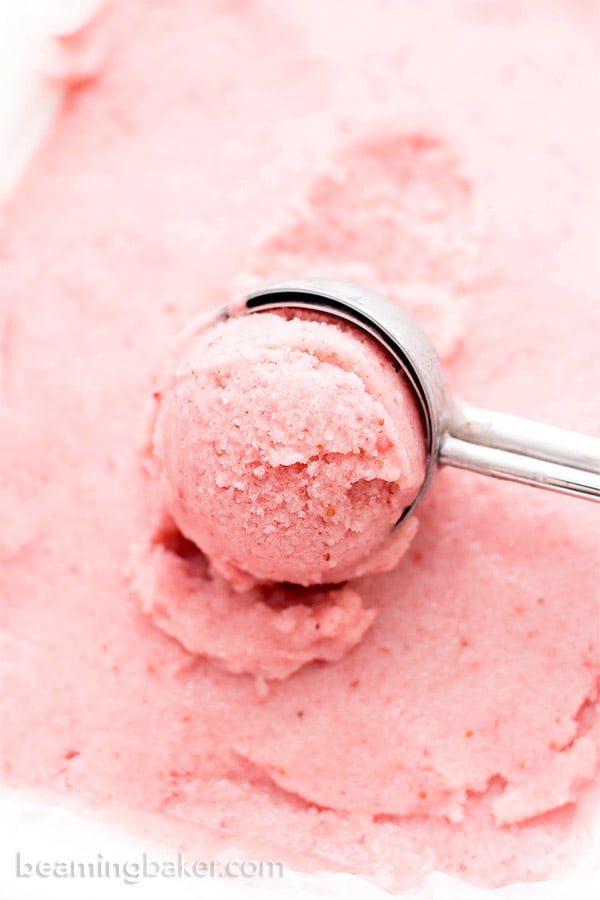 4 Ingredient Homemade Strawberry Sorbet (V+GF): an easy recipe for deliciously creamy and refreshing strawberry sorbet. #Vegan #DairyFree #Paleo #GlutenFree | BeamingBaker.com