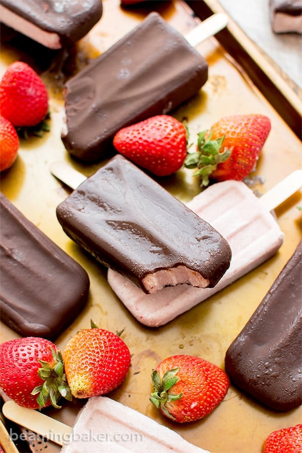 Chocolate-covered Strawberry Ice Cream Bars (V+GF): a 6 ingredient recipe for amazing ice cream bars that taste like chocolate-covered strawberries. #Vegan #DairyFree #Paleo #GlutenFree | BeamingBaker.com
