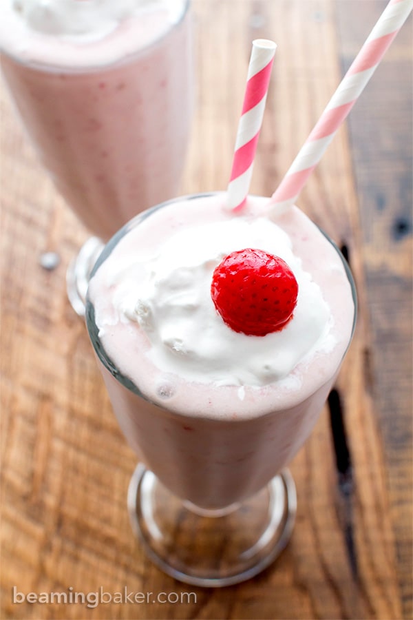 Vegan Strawberry Coconut Milkshake (V+GF): a 4 ingredient recipe for creamy and thick strawberry coconut milkshakes. #Vegan #GlutenFree #DairyFree #Paleo | BeamingBaker.com