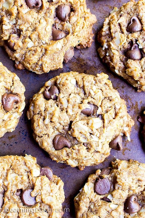 Almond Butter Oatmeal Chocolate Chip Cookies (V+GF): An easy recipe for deliciously simple chocolate chip cookies packed with almond butter, oats and coconut. #Vegan #GlutenFree #DairyFree | BeamingBaker.com