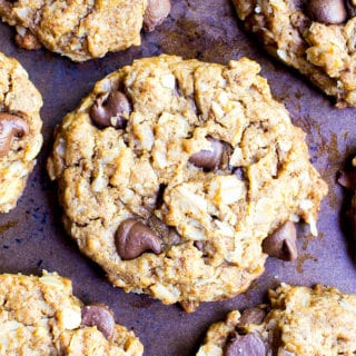Almond Butter Oatmeal Chocolate Chip Cookies (V+GF): An easy recipe for deliciously simple chocolate chip cookies packed with almond butter, oats and coconut. #Vegan #GlutenFree #DairyFree | BeamingBaker.com