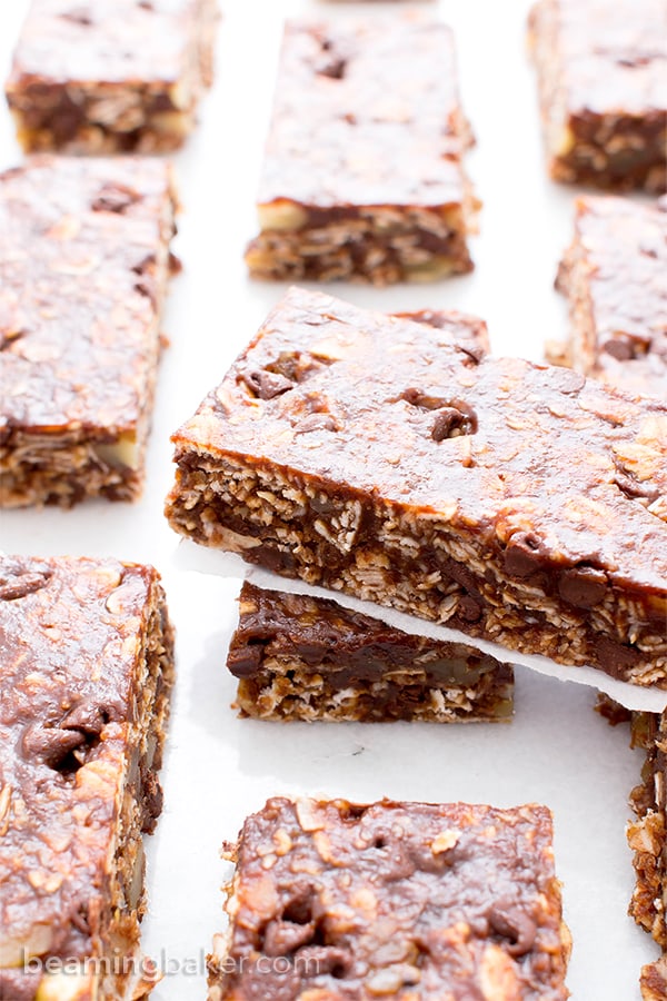 No Bake Double Chocolate Chip Granola Bars (V+GF): an easy recipe for deliciously chewy double chocolate granola bars made with simple ingredients. #Vegan #GlutenFree #DairyFree | BeamingBaker.com