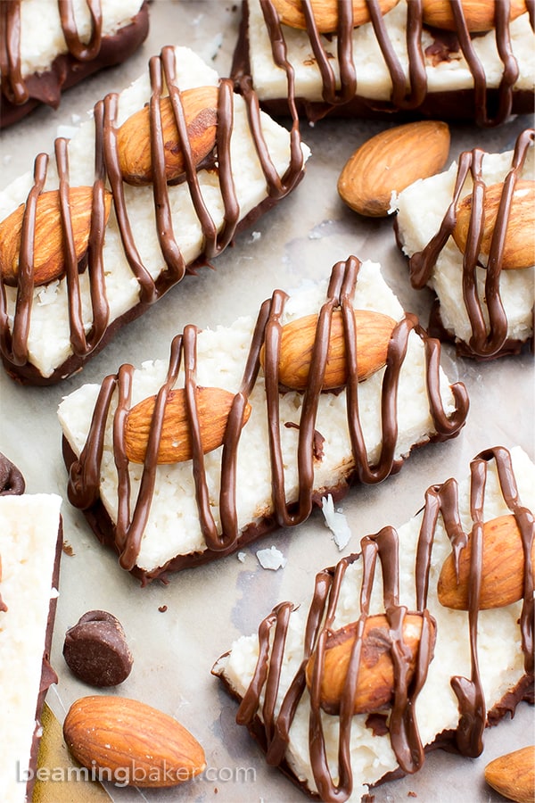 Paleo Almond Joy (V, GF, DF): a 5-ingredient recipe for deliciously satisfying homemade Almond Joy candy bars bursting with coconut and chocolate. #Paleo #Vegan #GlutenFree #DairyFree | BeamingBaker.com | @BeamingBaker