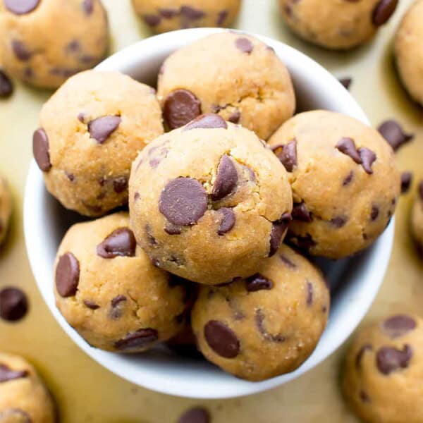 No Bake Pumpkin Chocolate Chip Cookie Dough Bites (Paleo, V, GF): a one bowl recipe for delicious cookie dough bites packed with pumpkin and chocolate chips. #Paleo #Vegan #GlutenFree #DairyFree | BeamingBaker.com