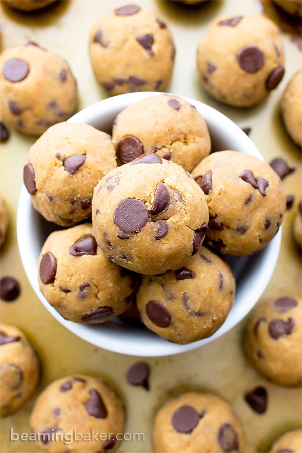 No Bake Pumpkin Chocolate Chip Cookie Dough Bites (Paleo, V, GF): a one bowl recipe for delicious cookie dough bites packed with pumpkin and chocolate chips. #Paleo #Vegan #GlutenFree #DairyFree | BeamingBaker.com