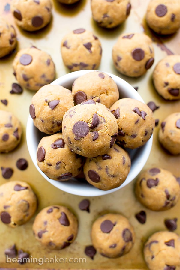 No Bake Pumpkin Chocolate Chip Cookie Dough Bites (Paleo, V, GF): a one bowl recipe for delicious cookie dough bites packed with pumpkin and chocolate chips. #Paleo #Vegan #GlutenFree #DairyFree | BeamingBaker.com