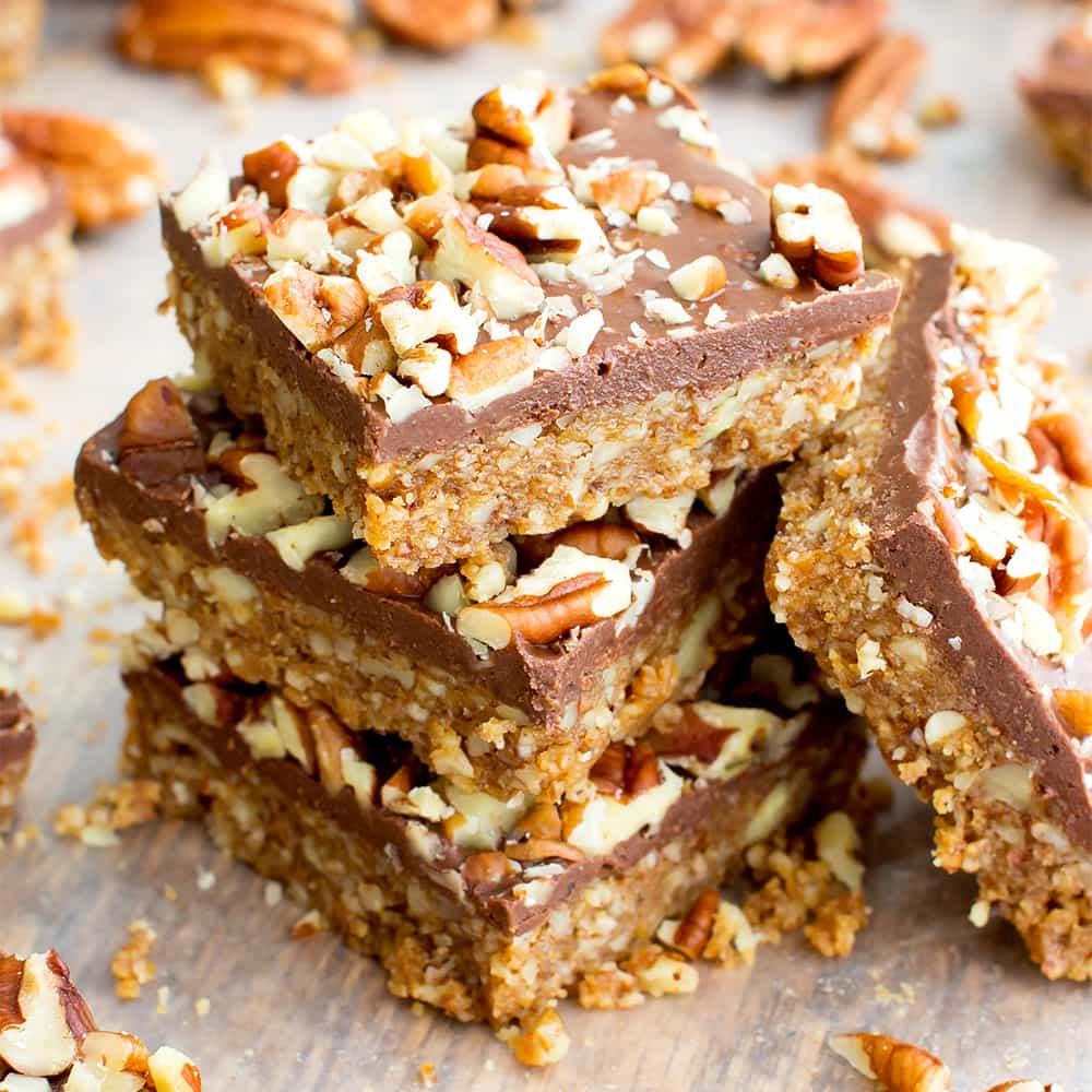 No Bake Paleo Chocolate Pecan Bars (V, GF, Paleo): a 5-ingredient, no bake recipe for deliciously textured pecan bars topped with a thick layer of chocolate and nuts. #Paleo #Vegan #GlutenFree #DairyFree | BeamingBaker.com
