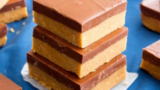 4 Ingredient No Bake Chocolate Peanut Butter Bars (V, GF, DF): an easy recipe for thick, decadent peanut butter bars that taste like Reese’s. #Vegan #GlutenFree #DairyFree BeamingBaker.com