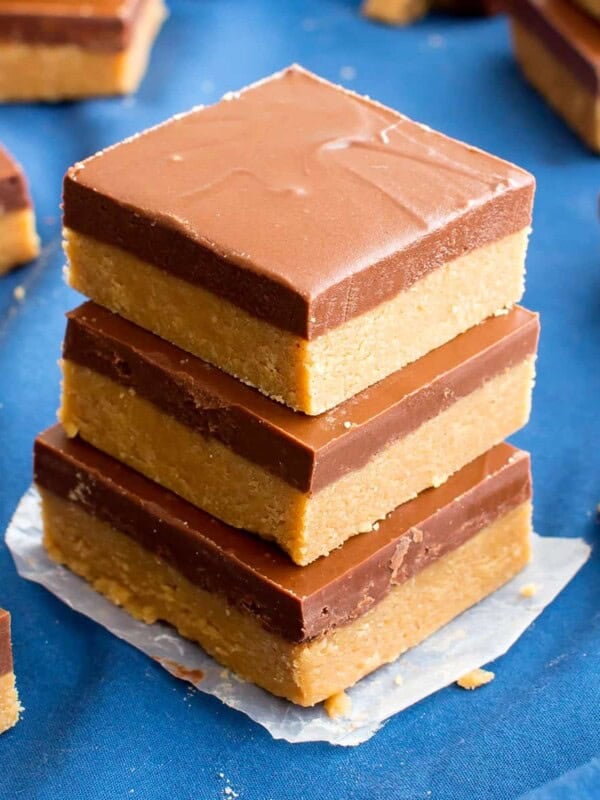 4 Ingredient No Bake Chocolate Peanut Butter Bars (V, GF, DF): an easy recipe for thick, decadent peanut butter bars that taste like Reese’s. #Vegan #GlutenFree #DairyFree BeamingBaker.com