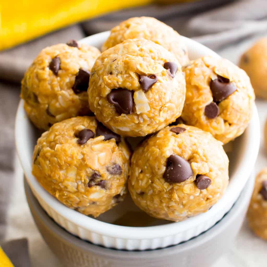 No Bake Peanut Butter Coconut Chocolate Chip Bites (V, GF, DF): a one bowl recipe for delicious protein-packed energy bites bursting with PB, chocolate and coconut! #Vegan #GlutenFree #DairyFree | BeamingBaker.com