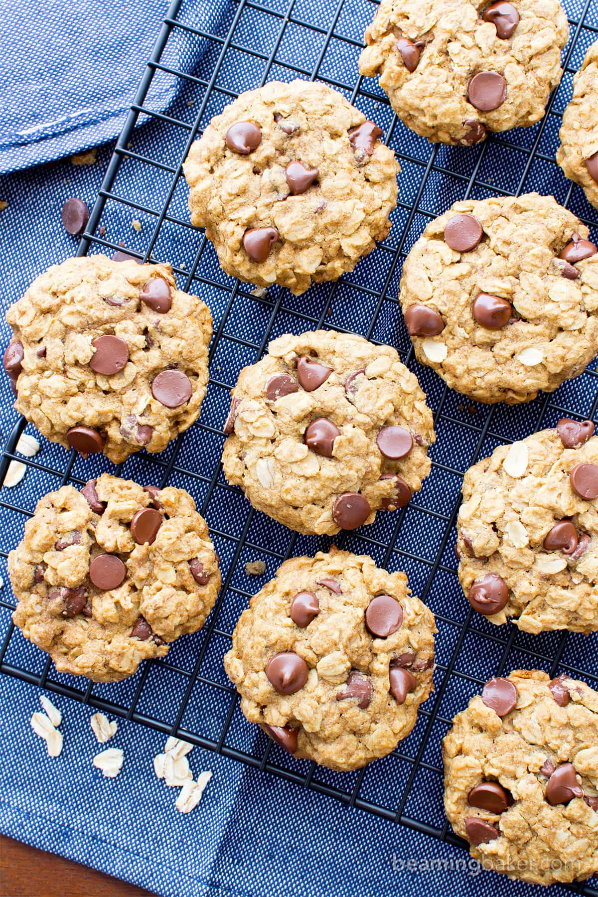 Gluten Free Vegan Oatmeal Chocolate Chip Cookies (GF): a simple vegan oatmeal chocolate chip cookies recipe that yields soft & buttery oatmeal cookies packed with melty chocolate chips! Dairy-Free, Refined Sugar-Free. #OatmealCookies #GlutenFree #Vegan #ChocolateChip | Recipe at BeamingBaker.com