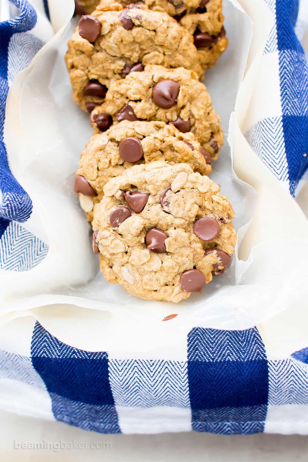 Gluten Free Vegan Oatmeal Chocolate Chip Cookies (V, GF, Dairy-Free): an easy recipe for soft, chewy oatmeal cookies bursting with chocolate chips and oats! #Vegan #GlutenFree #OatFlour #DairyFree | BeamingBaker.com