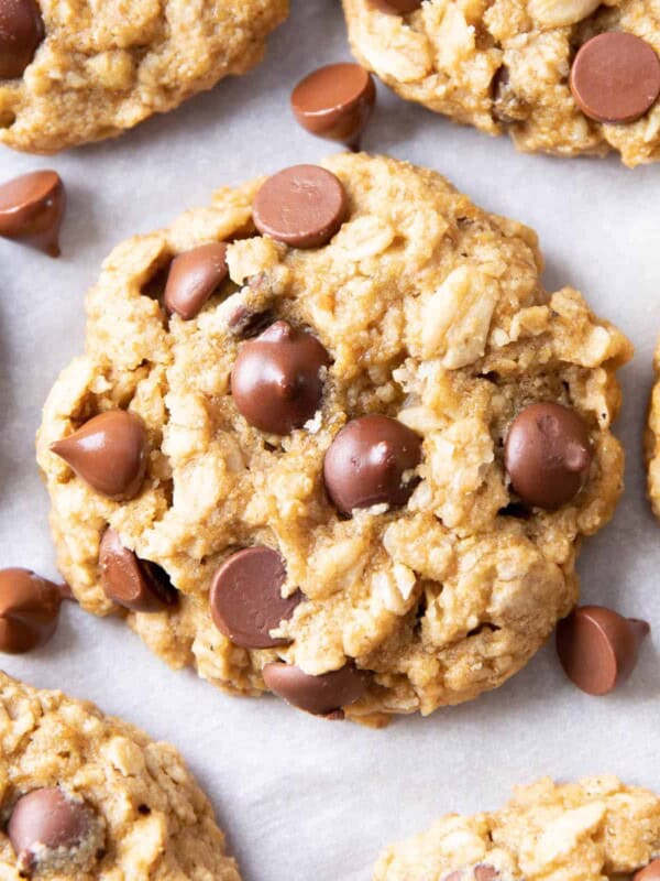 Gluten Free Vegan Oatmeal Chocolate Chip Cookies (GF): a simple vegan oatmeal chocolate chip cookies recipe that yields soft & buttery oatmeal cookies packed with melty chocolate chips! Dairy-Free, Refined Sugar-Free. #OatmealCookies #GlutenFree #Vegan #ChocolateChip | Recipe at BeamingBaker.com