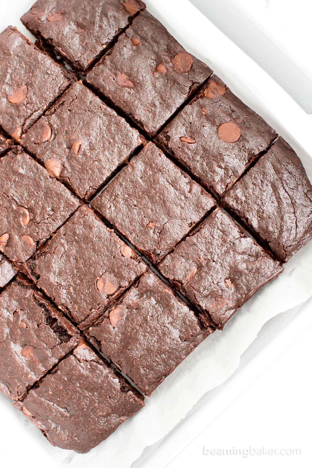 Ultimate Fudgy Paleo Vegan Brownies Recipe (GF): ultra-moist, deep chocolate flavor, fudgy, gooey YUM—the BEST paleo brownies recipe! Made with almond flour, Gluten Free, Vegan, Grain-Free. #Paleo #Brownies #Vegan #Fudgy | Recipe at BeamingBaker.com