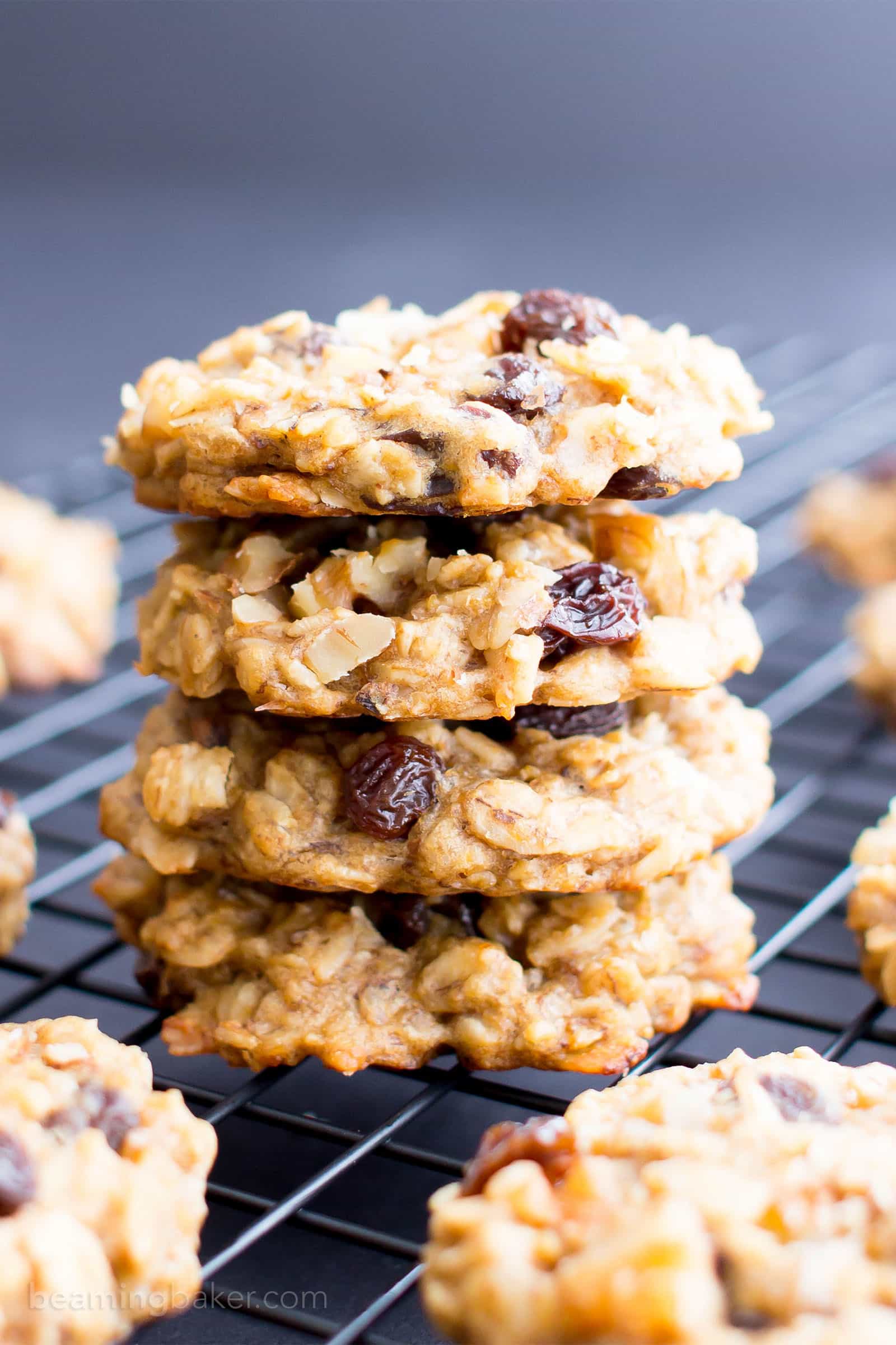 These delicious Vegan Banana Cookies are made with natural peanut butter, fiber-rich oats and deliciously ripe bananas! Easy recipe to customize and enjoy on the go! #Vegan #Breakfast #Banana #Cookies | Recipe at BeamingBaker.com