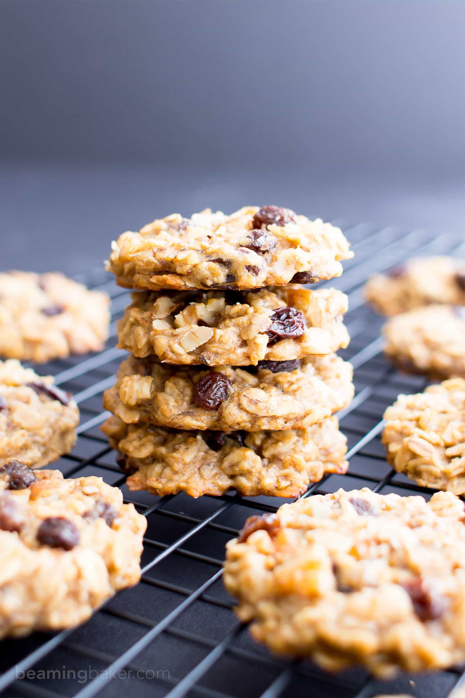 These delicious Vegan Banana Cookies are made with natural peanut butter, fiber-rich oats and deliciously ripe bananas! Easy recipe to customize and enjoy on the go! #Vegan #Breakfast #Banana #Cookies | Recipe at BeamingBaker.com