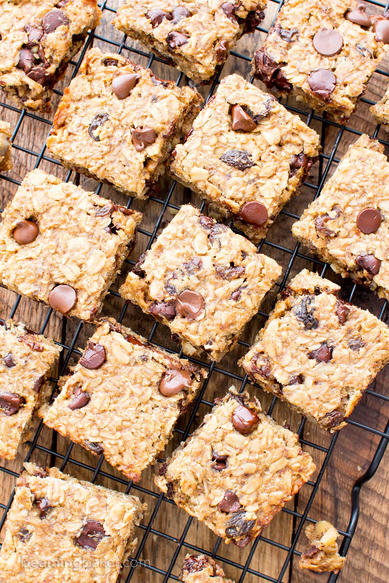 Gluten Free Banana Chocolate Chip Oatmeal Breakfast Bars (V, GF): a one bowl recipe for simply delicious banana breakfast bars packed with your favorites for a good morning! #Vegan #GlutenFree #DairyFree | BeamingBaker.com