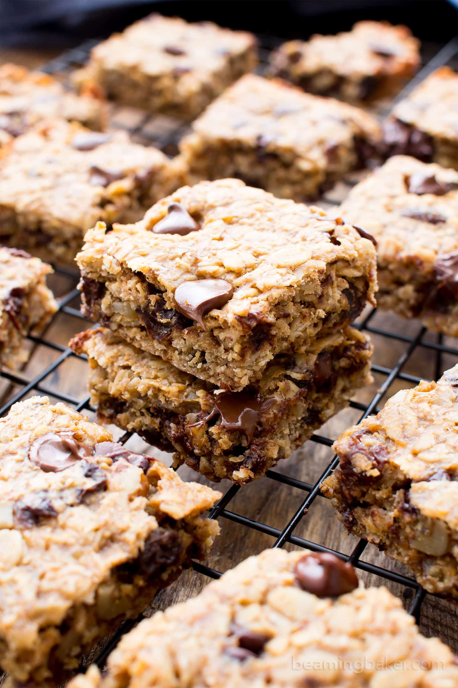 Gluten Free Banana Chocolate Chip Oatmeal Breakfast Bars (V, GF): a one bowl recipe for simply delicious banana breakfast bars packed with your favorites for a good morning! #Vegan #GlutenFree #DairyFree | BeamingBaker.com