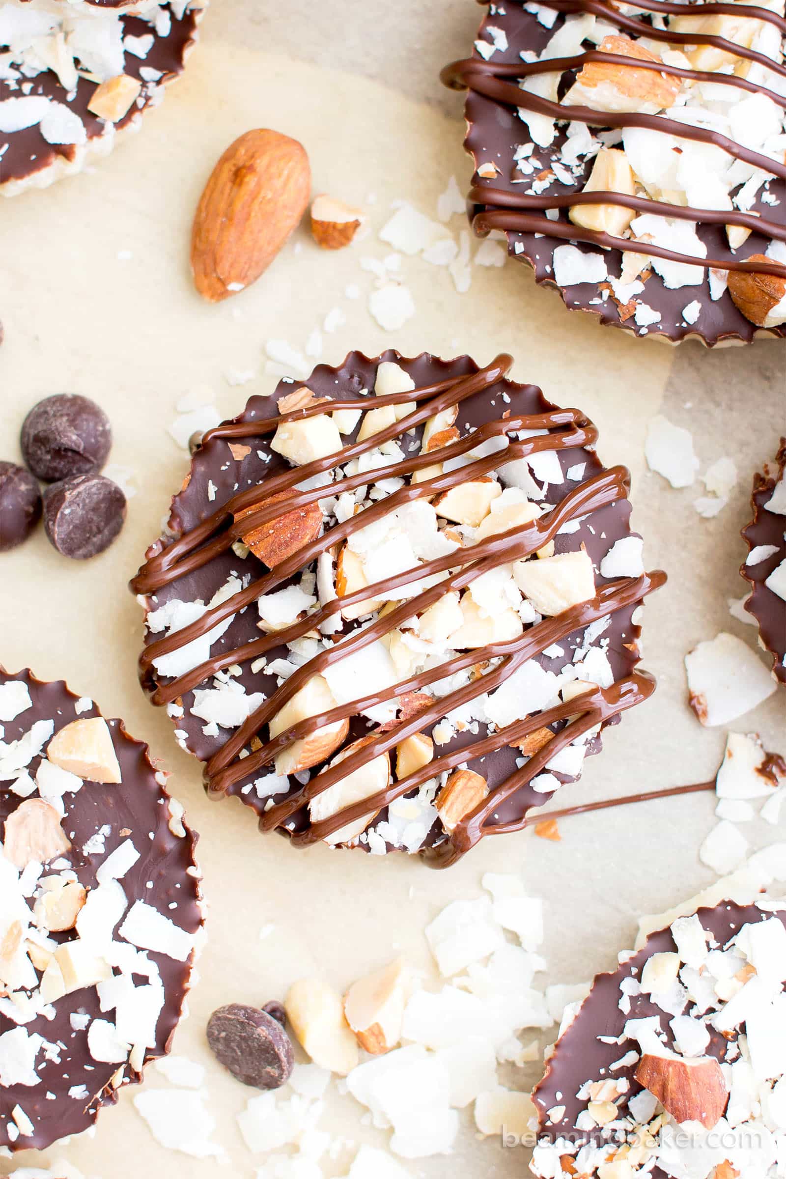 Homemade Almond Joy Cups (Paleo, V, GF): a 5-ingredient recipe for rich, nutty Almond Joy cups layered in velvety chocolate. #Paleo #Vegan #GlutenFree #5Ingredient | BeamingBaker.com