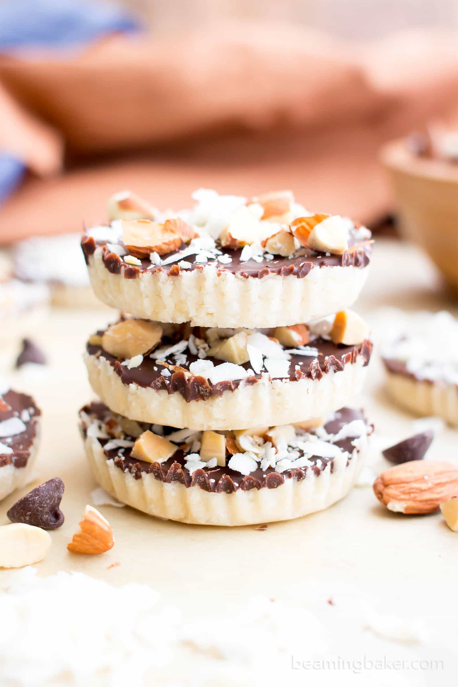 Homemade Almond Joy Cups (Paleo, V, GF): a 5-ingredient recipe for rich, nutty Almond Joy cups layered in velvety chocolate. #Paleo #Vegan #GlutenFree #5Ingredient | BeamingBaker.com