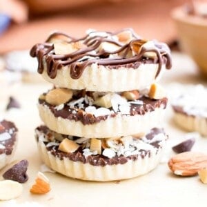 Homemade Almond Joy Cups (Paleo, V, GF): a 5-ingredient recipe for rich, nutty Almond Joy cups layered in velvety chocolate. #Paleo #Vegan #GlutenFree #5Ingredient | BeamingBaker.com