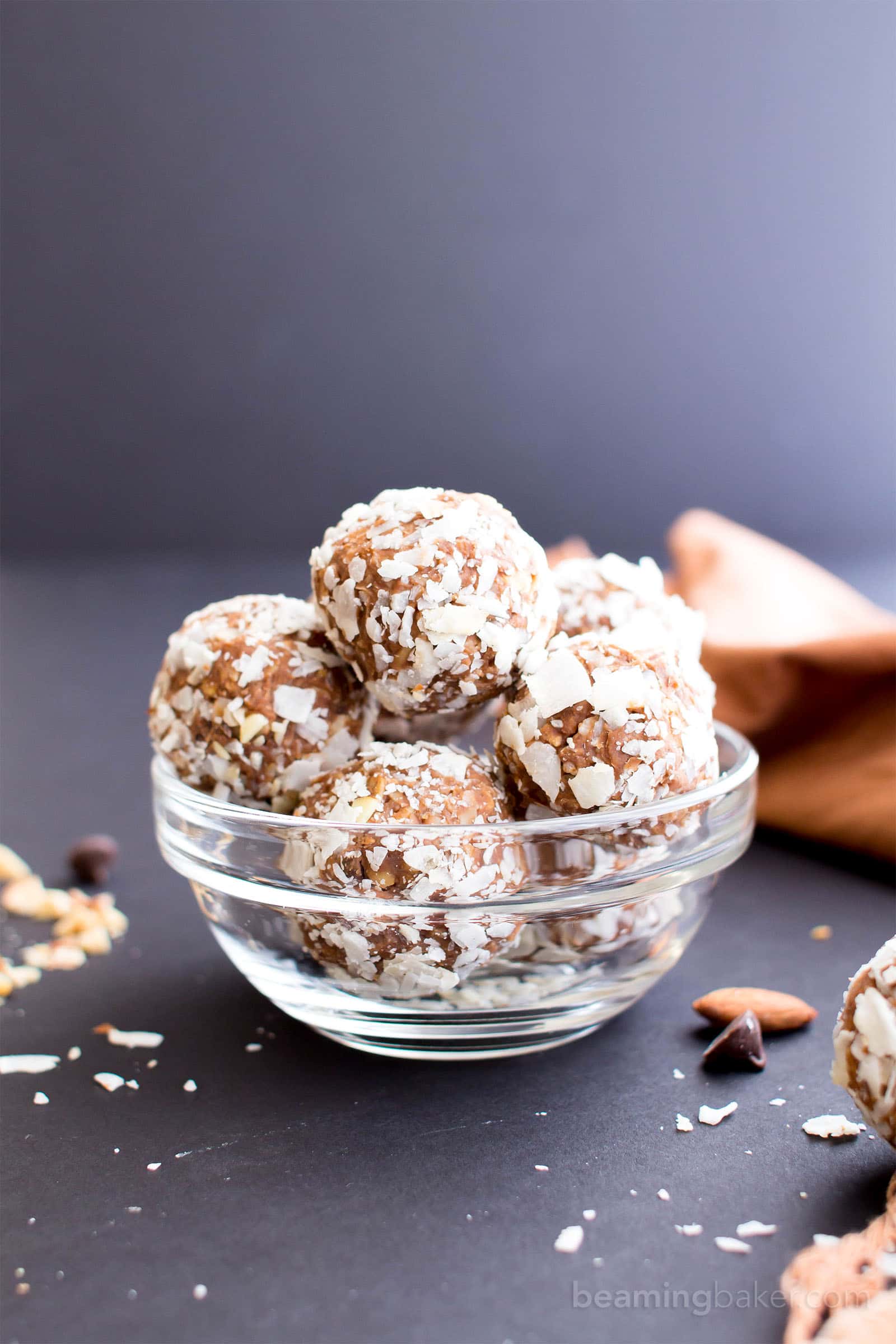 No Bake Gluten Free Almond Joy Energy Bites (V, GF, DF): a one bowl recipe for protein-packed energy bites bursting with Almond Joy flavors, made with simple ingredients. #Vegan #GlutenFree #DairyFree | BeamingBaker.com