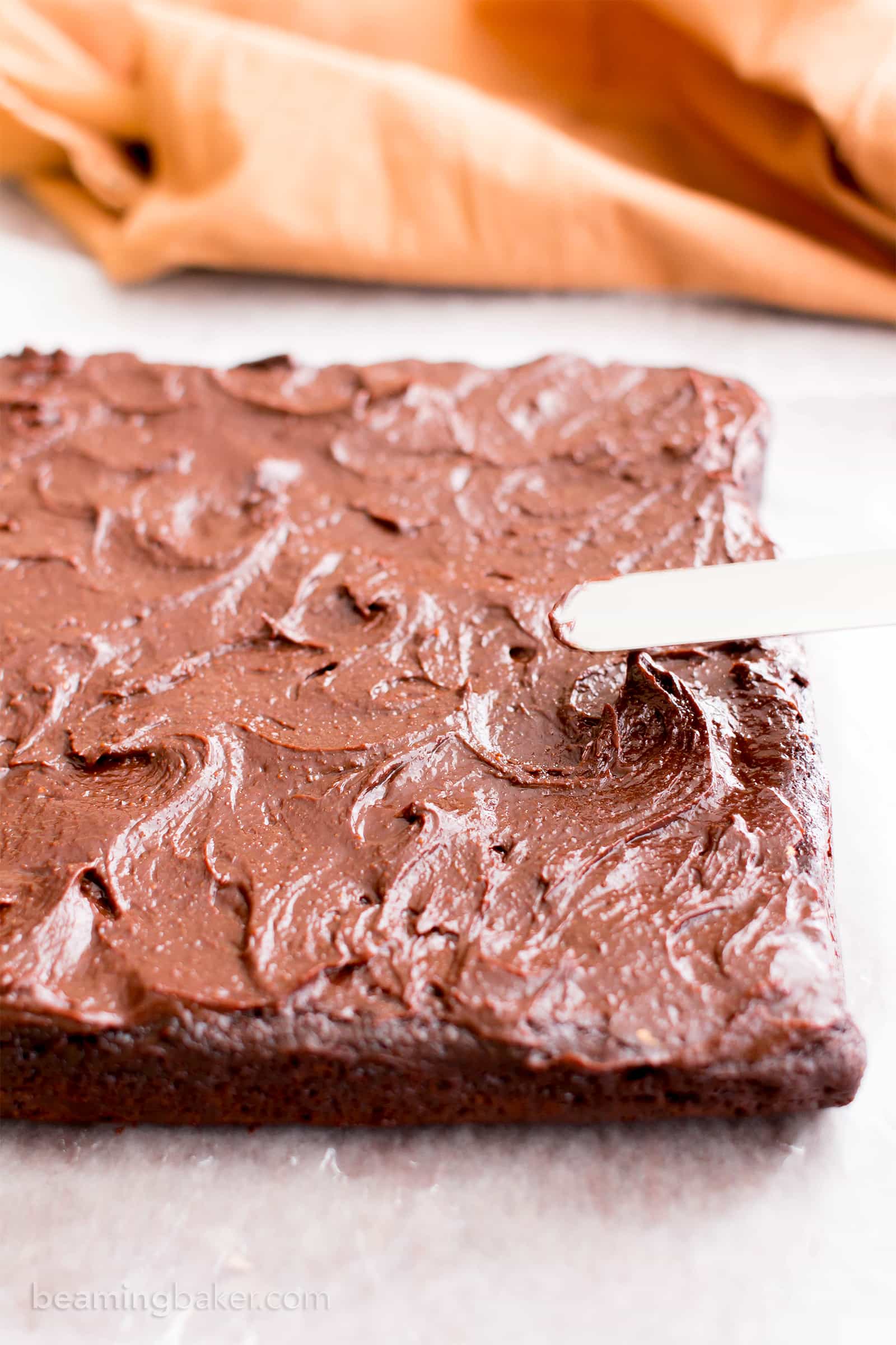 Chocolate Almond Butter Frosted Fudgy Paleo Brownies (V, GF, Paleo): a one bowl recipe for seriously fudgy paleo brownies topped with rich chocolate almond butter frosting! #Vegan #Paleo #GlutenFree #DairyFree | BeamingBaker.com