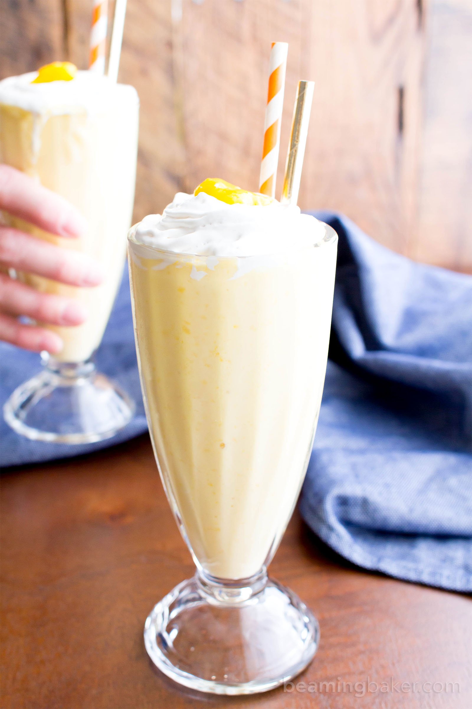 3 Ingredient Mango Coconut Paleo Milkshake (V, GF, Paleo): an easy, 3 ingredient recipe for super thick and frosty mango coconut milkshakes! #Paleo #Vegan #DairyFree #GlutenFree | BeamingBaker.com