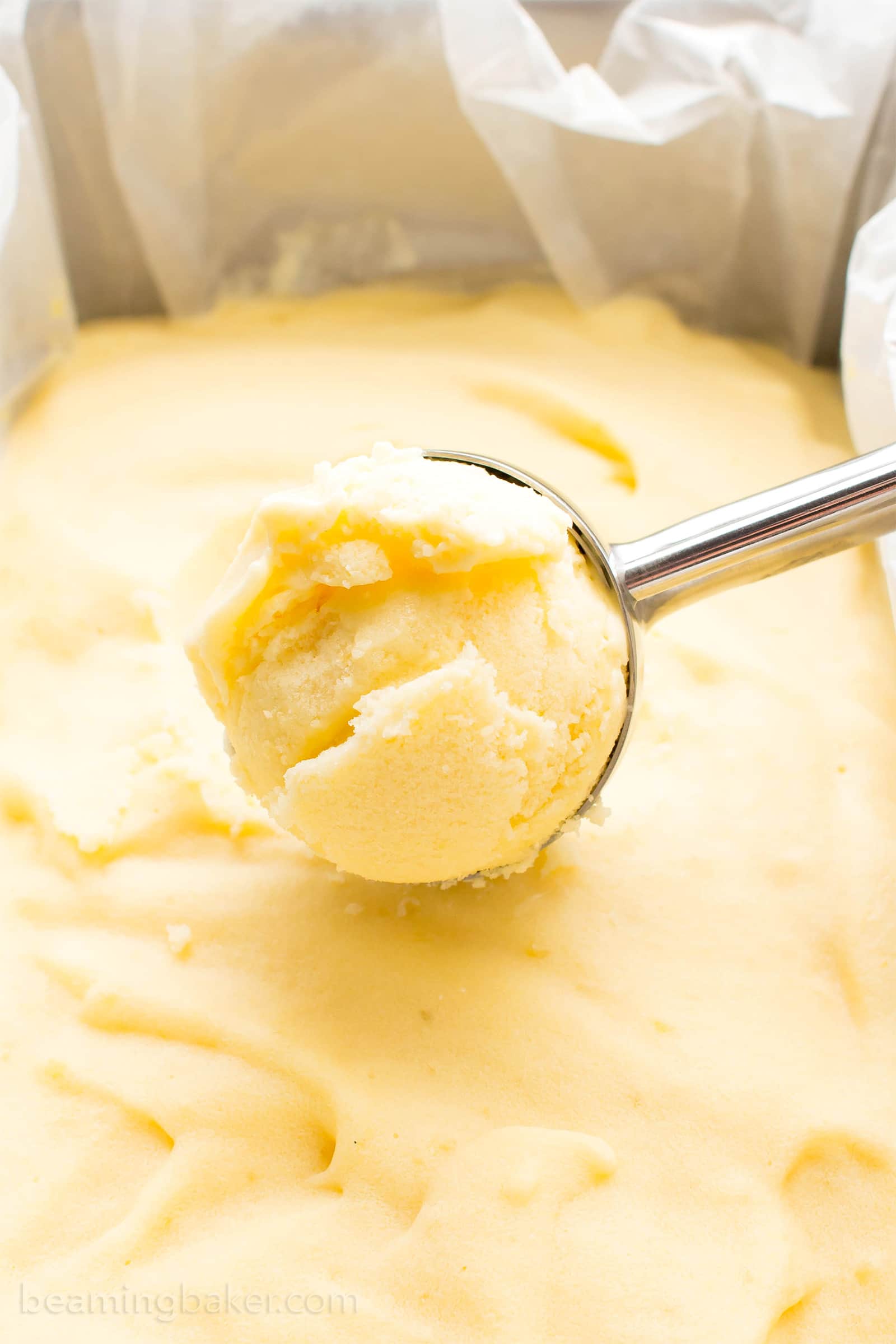 Homemade Mango Ice Cream: this 3 ingredient mango ice cream recipe is super EASY! 5 mins of prep for the best mango ice cream: rich & creamy with big mango flavor! Vegan, Dairy-Free, Healthy. #Mango #IceCream #Vegan #DairyFree | Recipe at BeamingBaker.com