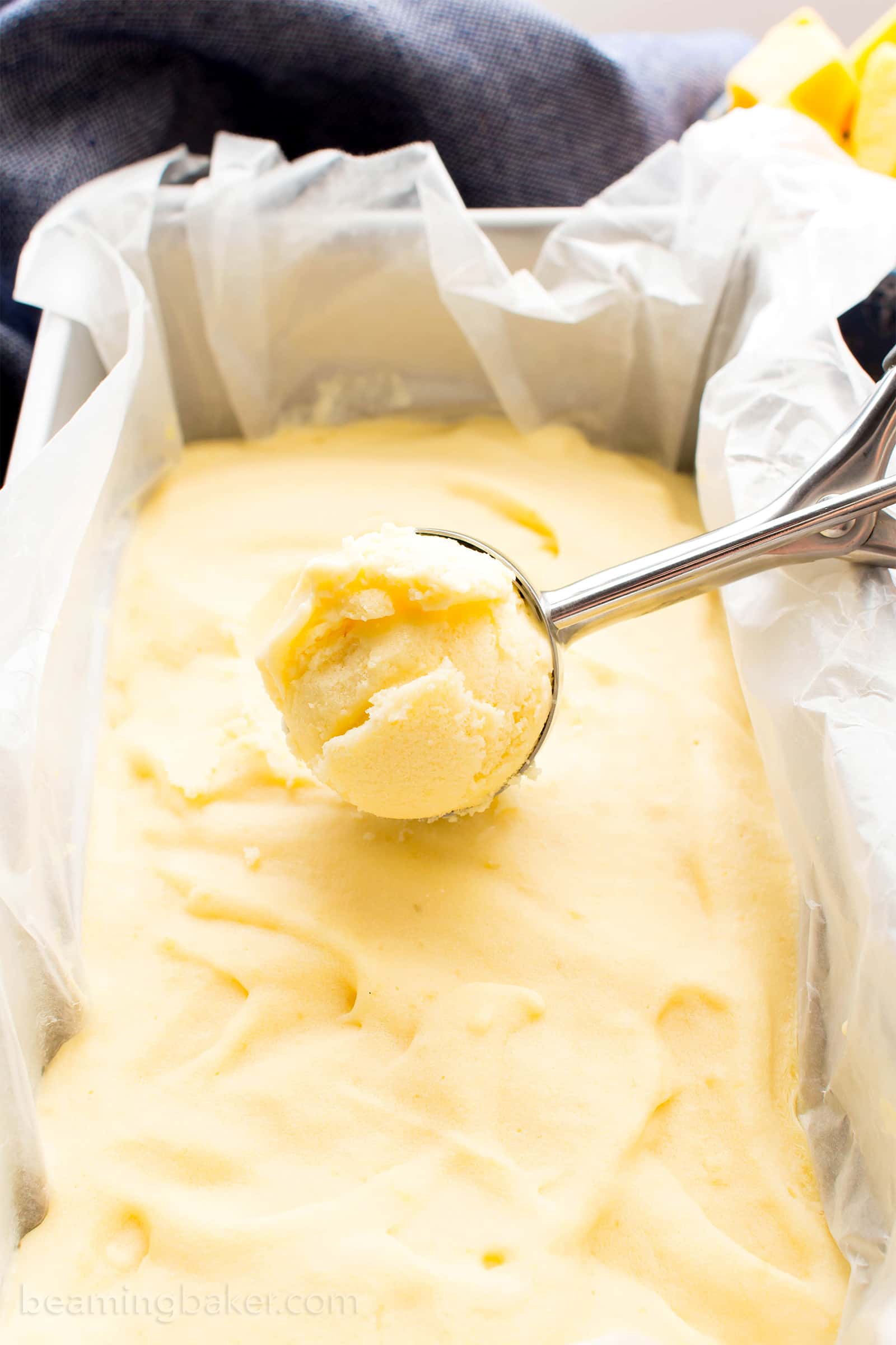 Homemade Mango Ice Cream: this 3 ingredient mango ice cream recipe is super EASY! 5 mins of prep for the best mango ice cream: rich & creamy with big mango flavor! Vegan, Dairy-Free, Healthy. #Mango #IceCream #Vegan #DairyFree | Recipe at BeamingBaker.com