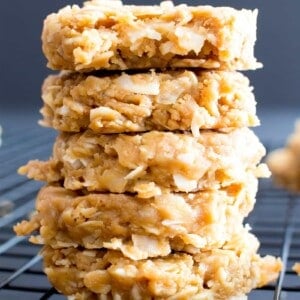 4 Ingredient No Bake Peanut Butter Coconut Oatmeal Cookies (V, GF): a one-bowl recipe for super easy to make peanut butter cookies packed with coconut and oats! #GlutenFree #Vegan #WholeGrain #RefinedSugarFree | BeamingBaker.com