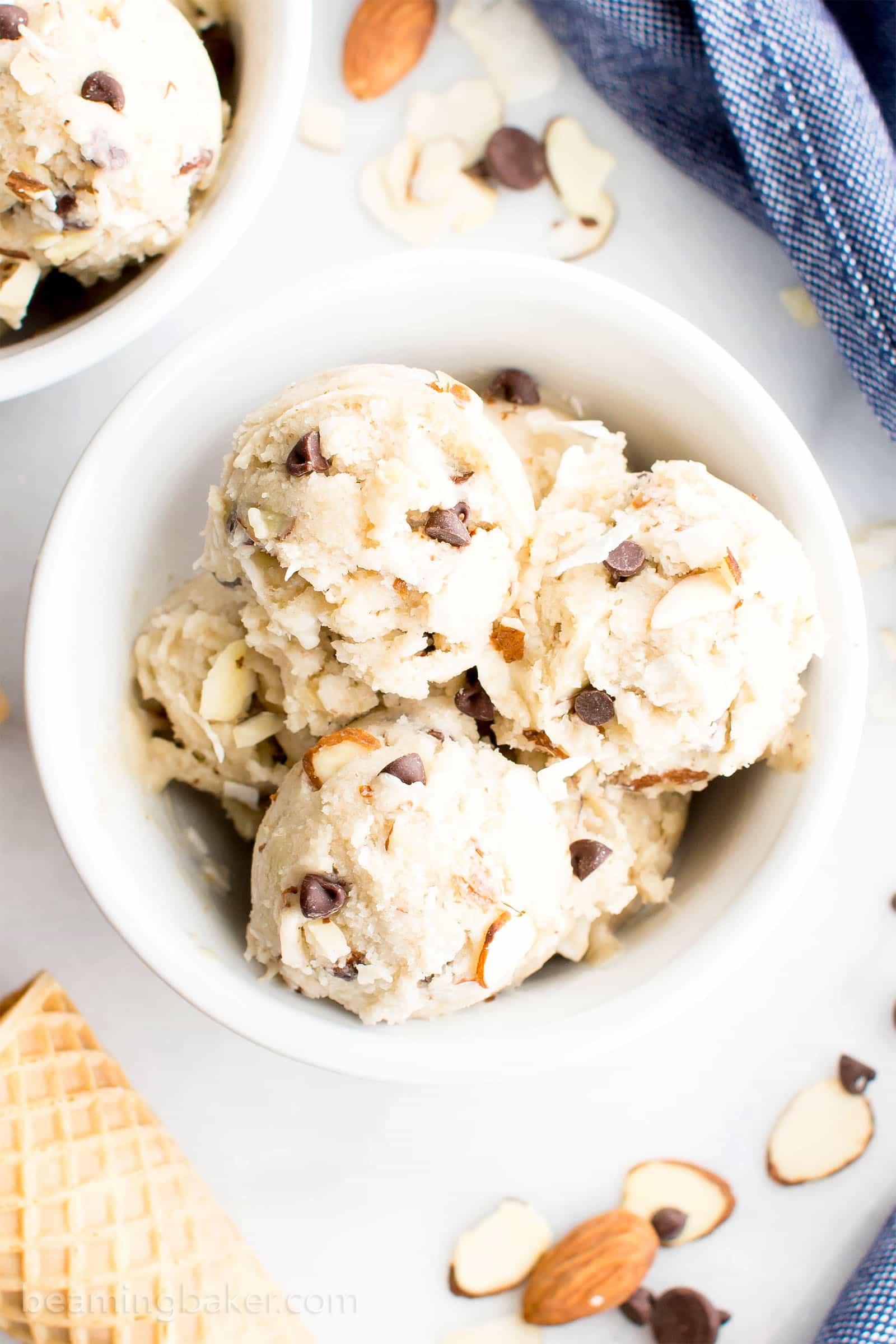 Almond Joy Vegan Paleo Ice Cream Recipe (Refined Sugar-Free): this gluten free dairy free ice cream is bursting with coconut, chocolate and Almond JOY flavors! Easy, No Churn, Delicious. #Paleo #Vegan #IceCream #AlmondJoy #DairyFree | Recipe at BeamingBaker.com