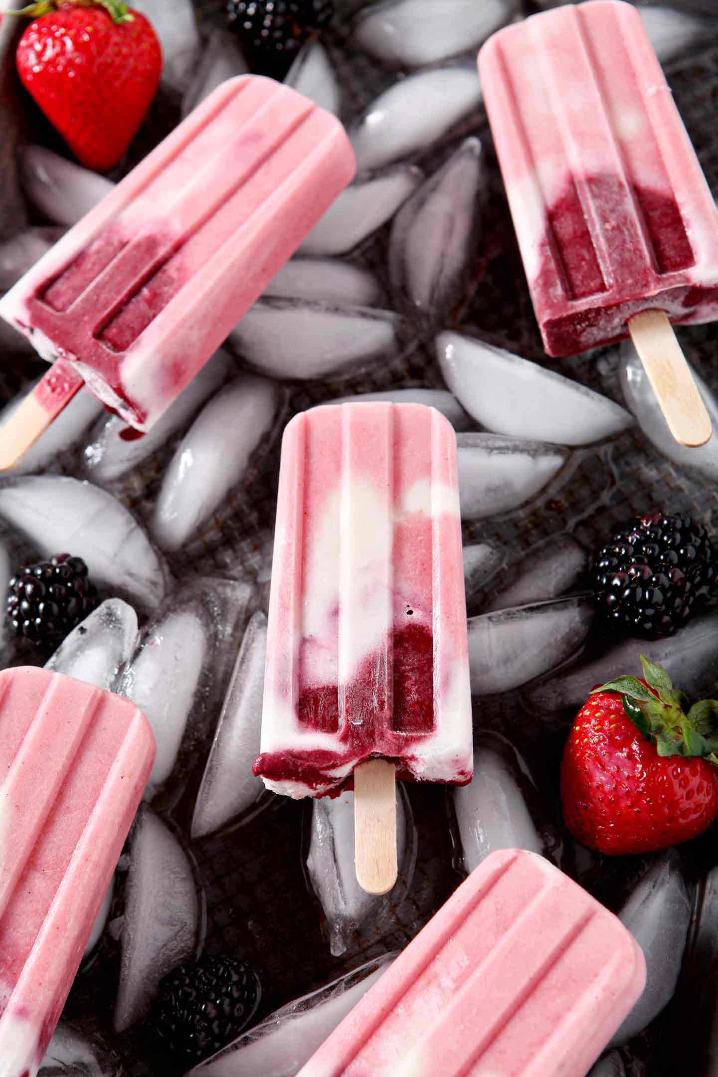 15 Healthy Frozen Desserts Made in a Popsicle Mold (V, DF, Paleo): a frozen dessert collection of dairy-free, paleo and vegan treats made with a popsicle mold! #Vegan #Paleo #DairyFree #GlutenFree | BeamingBaker.com