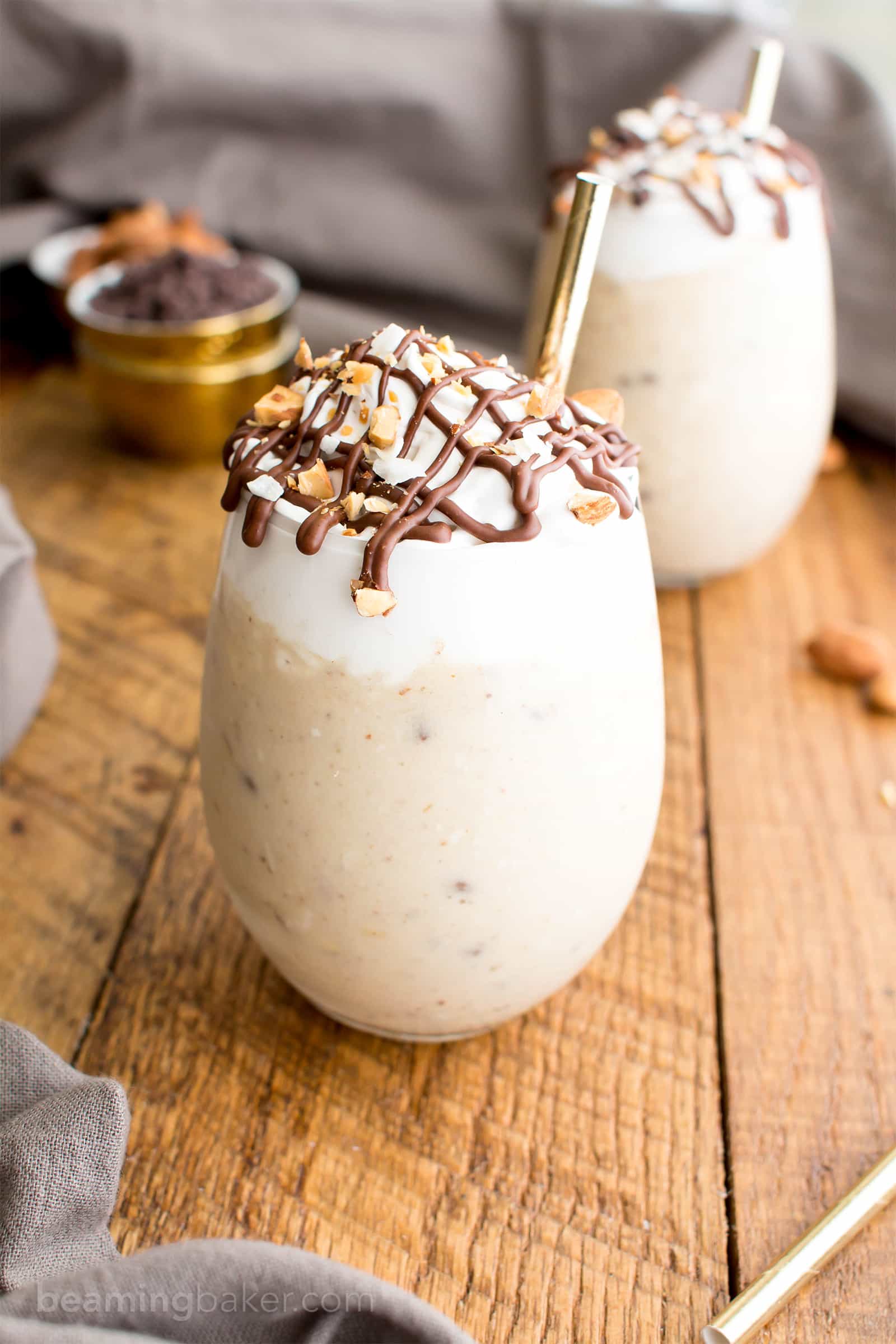 Paleo Almond Joy Milkshake (V, DF, Paleo): a deliciously decadent recipe for thick, creamy milkshakes bursting with coconut, chocolate and almonds! #Paleo #Vegan #DairyFree #GlutenFree | BeamingBaker.com