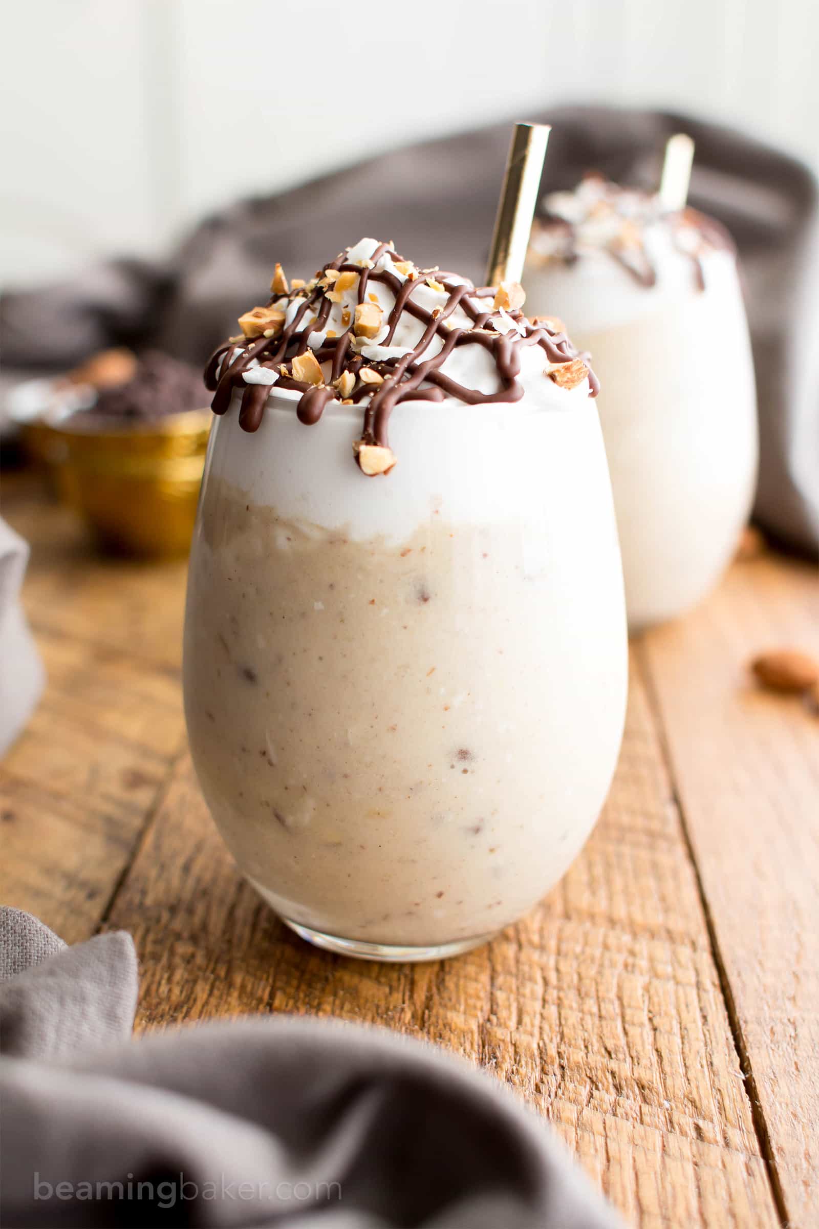 Paleo Almond Joy Milkshake (V, DF, Paleo): a deliciously decadent recipe for thick, creamy milkshakes bursting with coconut, chocolate and almonds! #Paleo #Vegan #DairyFree #GlutenFree | BeamingBaker.com