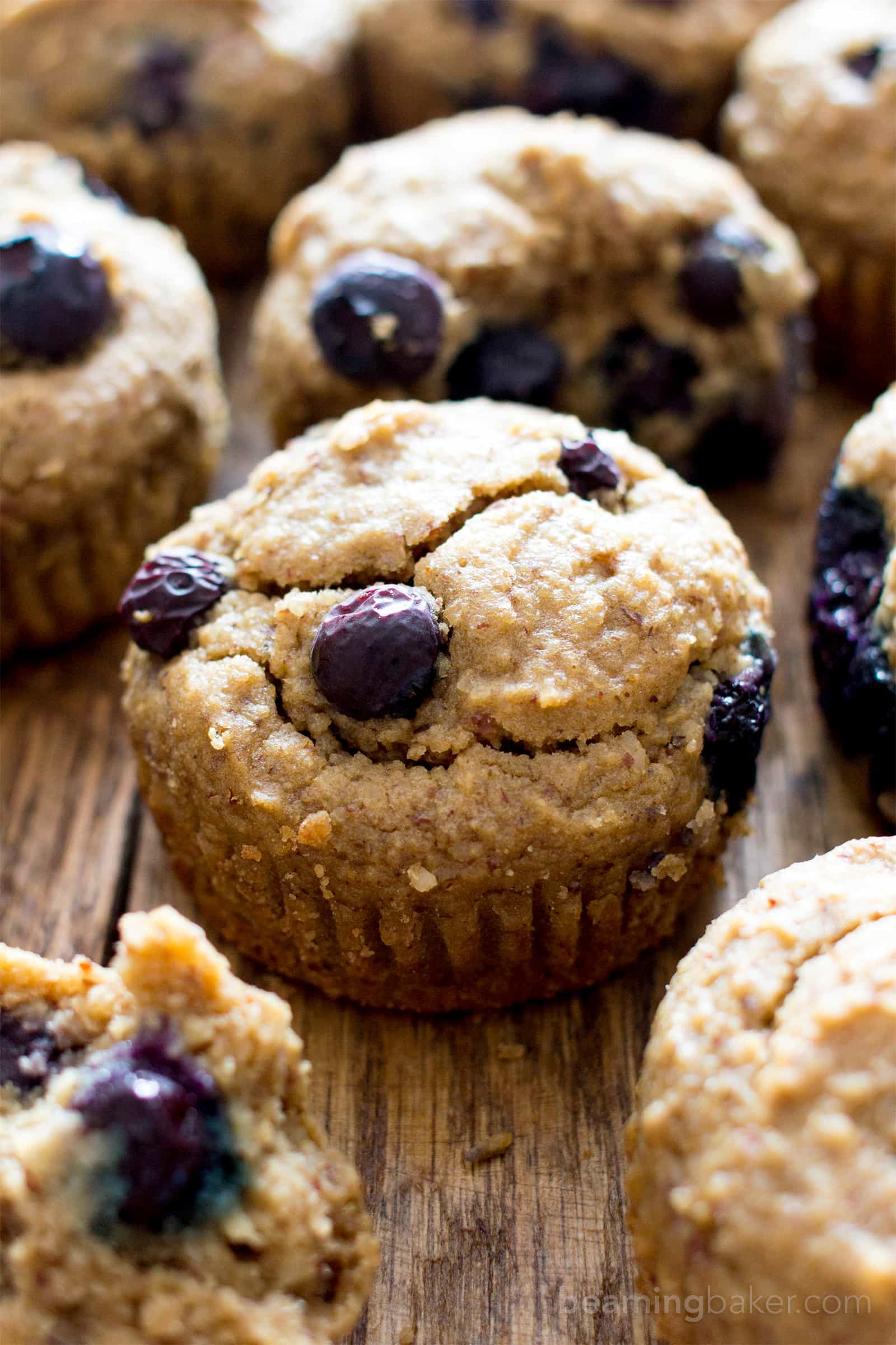 Gluten Free Vegan Blueberry Applesauce Muffins (V, GF): a one bowl recipe for soft & satisfying healthy blueberry muffins made with oat flour and applesauce. #Vegan #GlutenFree #WholeGrain #DairyFree #RefinedSugarFree | BeamingBaker.com
