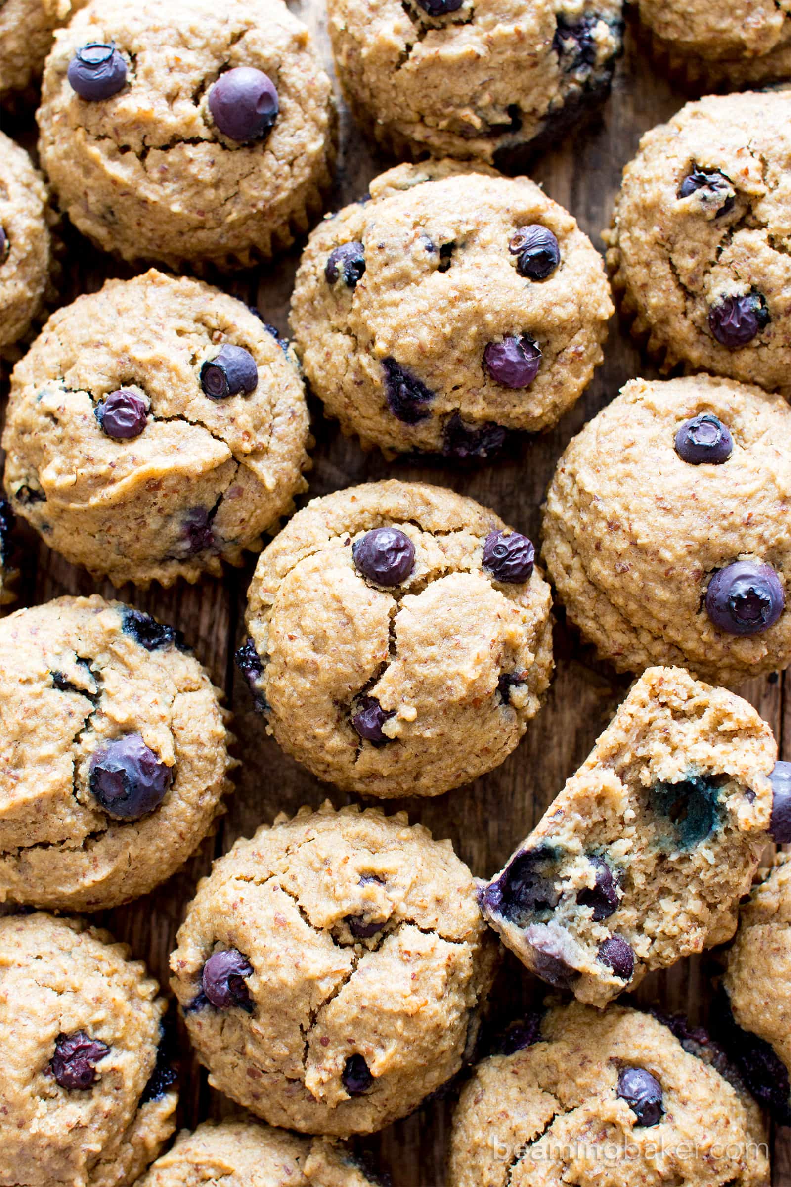 Gluten Free Vegan Blueberry Applesauce Muffins (V, GF): a one bowl recipe for soft & satisfying healthy blueberry muffins made with oat flour and applesauce. #Vegan #GlutenFree #WholeGrain #DairyFree #RefinedSugarFree | BeamingBaker.com