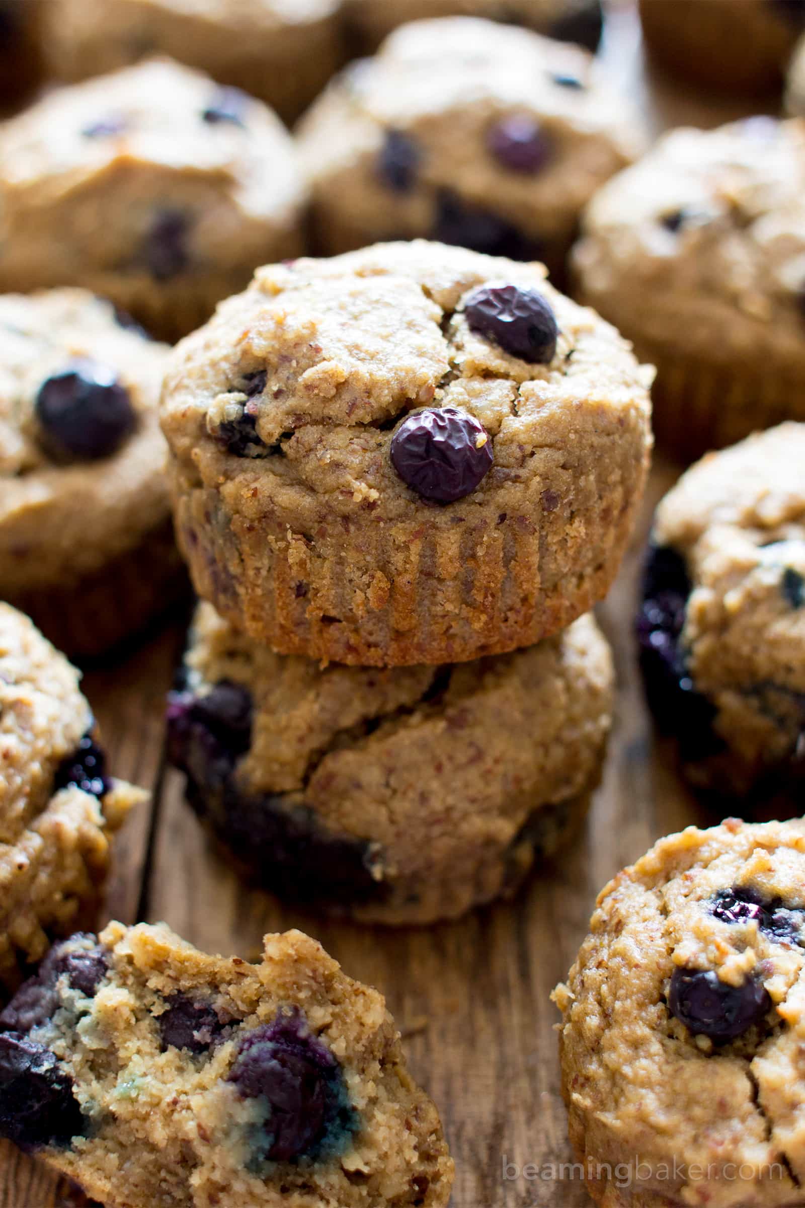 Gluten Free Vegan Blueberry Applesauce Muffins (V, GF): a one bowl recipe for soft & satisfying healthy blueberry muffins made with oat flour and applesauce. #Vegan #GlutenFree #WholeGrain #DairyFree #RefinedSugarFree | BeamingBaker.com