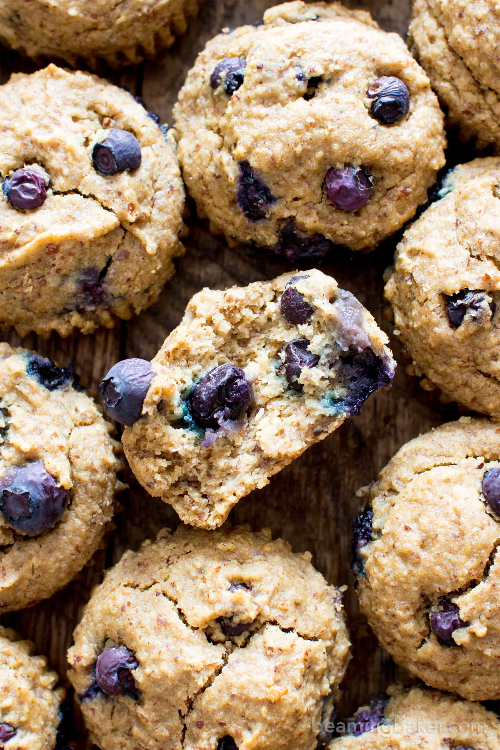 Gluten Free Vegan Blueberry Applesauce Muffins (V, GF): a one bowl recipe for soft & satisfying healthy blueberry muffins made with oat flour and applesauce. #Vegan #GlutenFree #WholeGrain #DairyFree #RefinedSugarFree | BeamingBaker.com