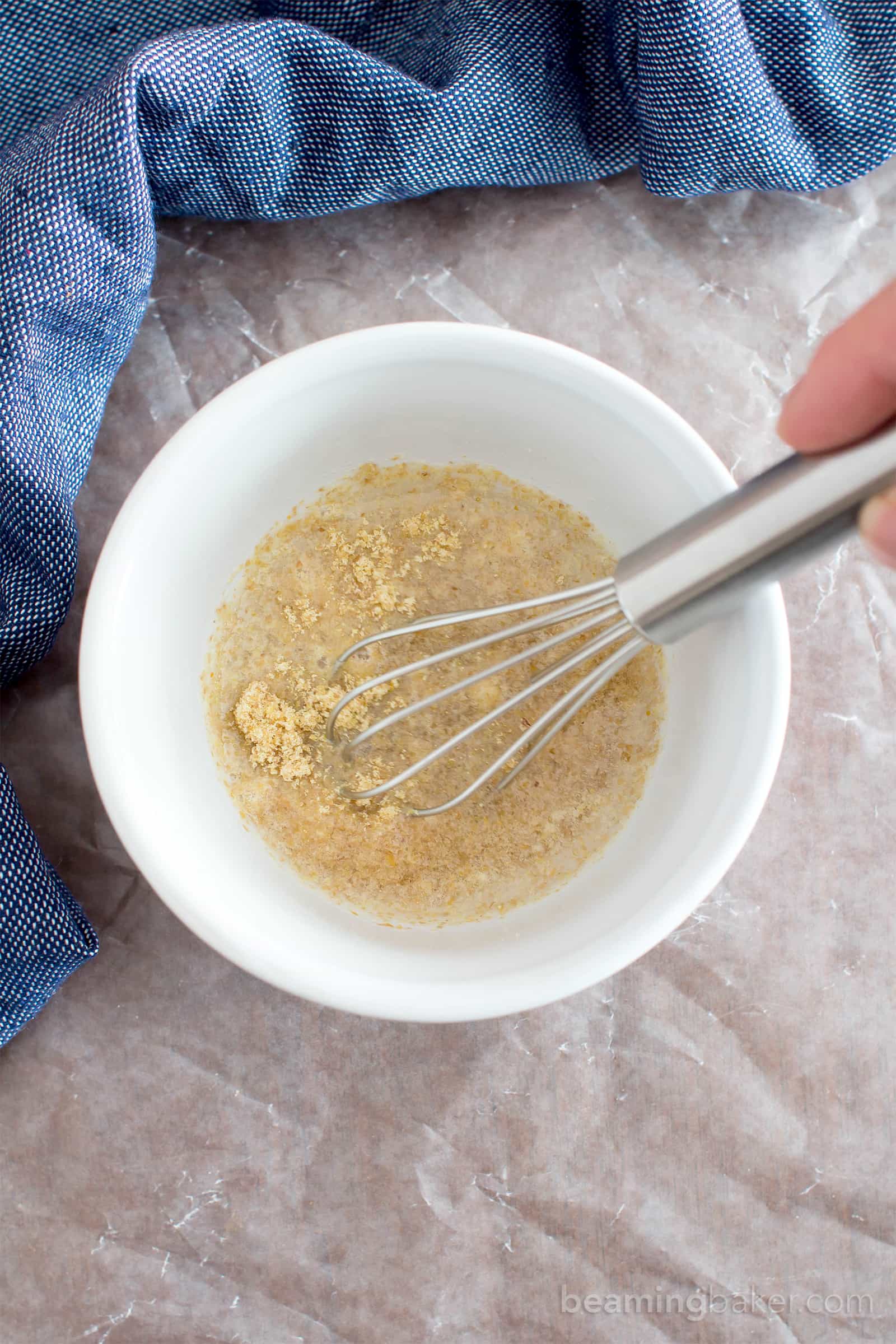 How to Make a Flax Egg: a step-by-step tutorial and guide on how to use this allergy-friendly vegan baking alternative for eggs. #Vegan #GlutenFree #DairyFree #Paleo | BeamingBaker.com