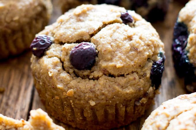 Gluten Free Vegan Blueberry Applesauce Muffins (V, GF): a one bowl recipe for soft & satisfying healthy blueberry muffins made with oat flour and applesauce. #Vegan #GlutenFree #WholeGrain #DairyFree #RefinedSugarFree | BeamingBaker.com 