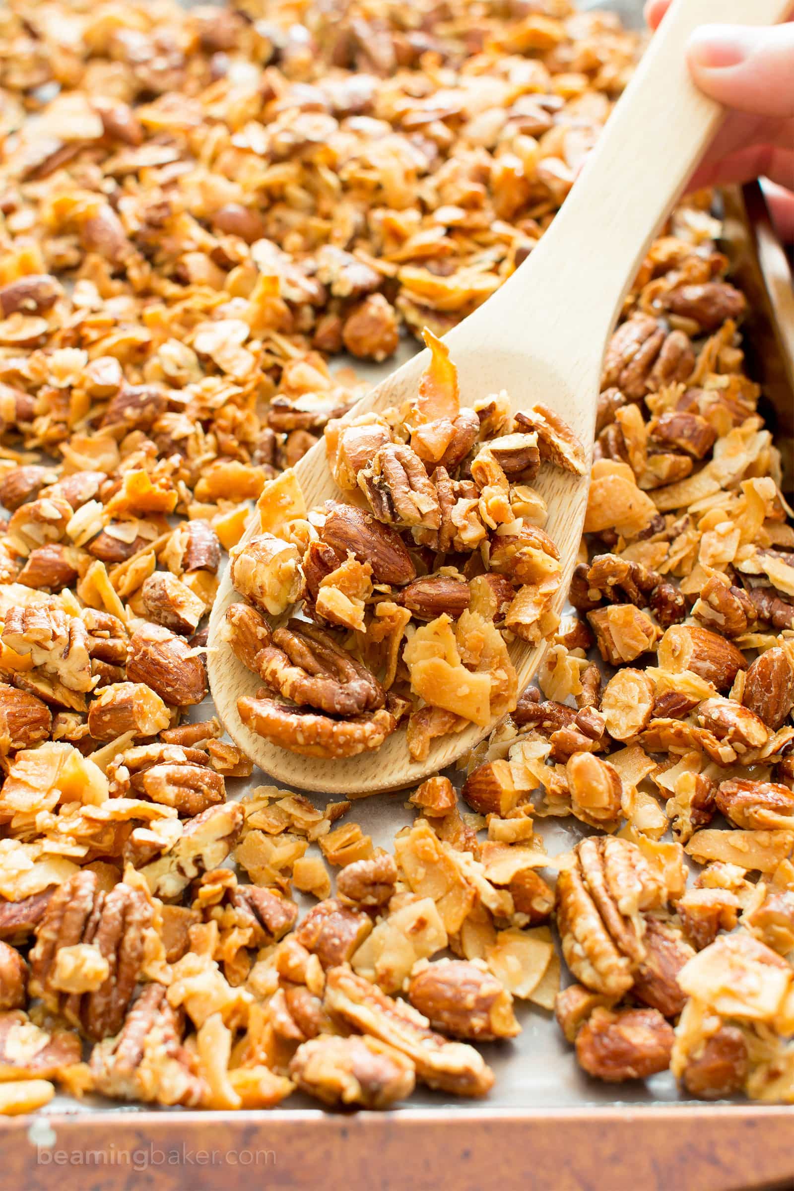 4 Ingredient Coconut Almond Pecan Paleo Granola (V, GF): a quick ‘n easy recipe for crunchy, salty & sweet granola packed with whole ingredients. #Paleo #Vegan #Snacks #Healthy #GlutenFree #DairyFree #RefinedSugarFree | BeamingBaker.com